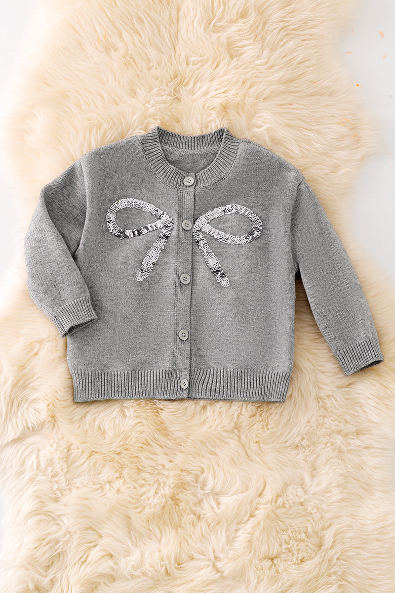Gray sequins cardigan with sequins bow.