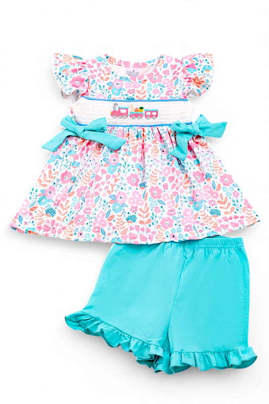 Pastel floral smocked tunic with side bows and cotton shorts.