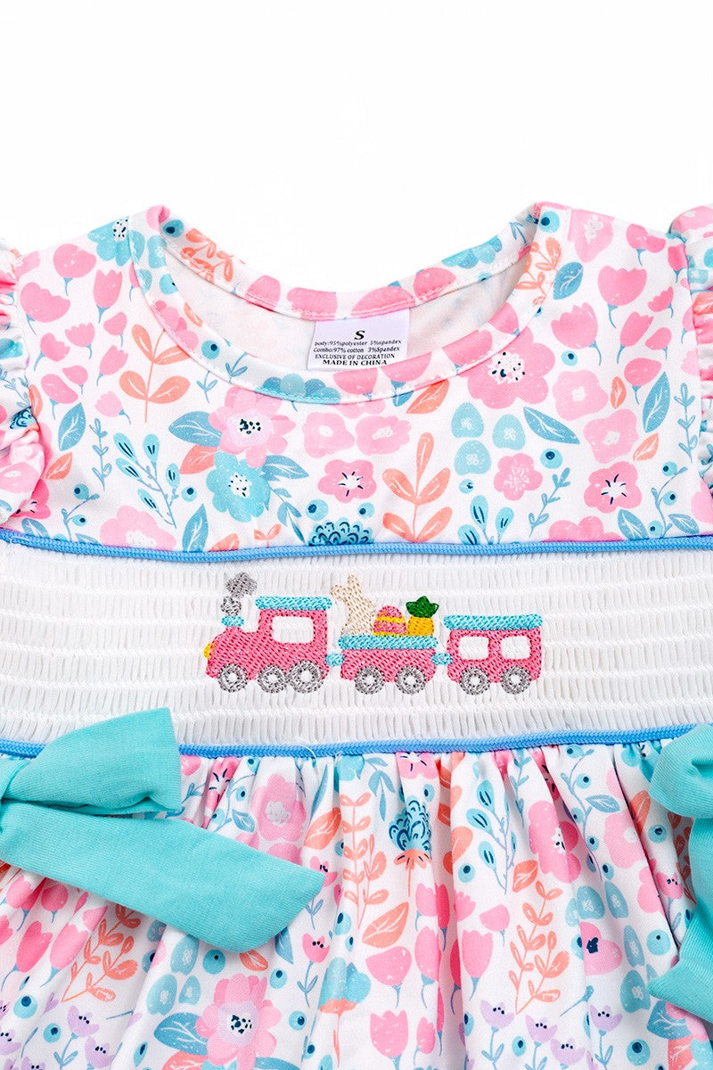 Pastel floral smocked tunic with side bows and cotton shorts.