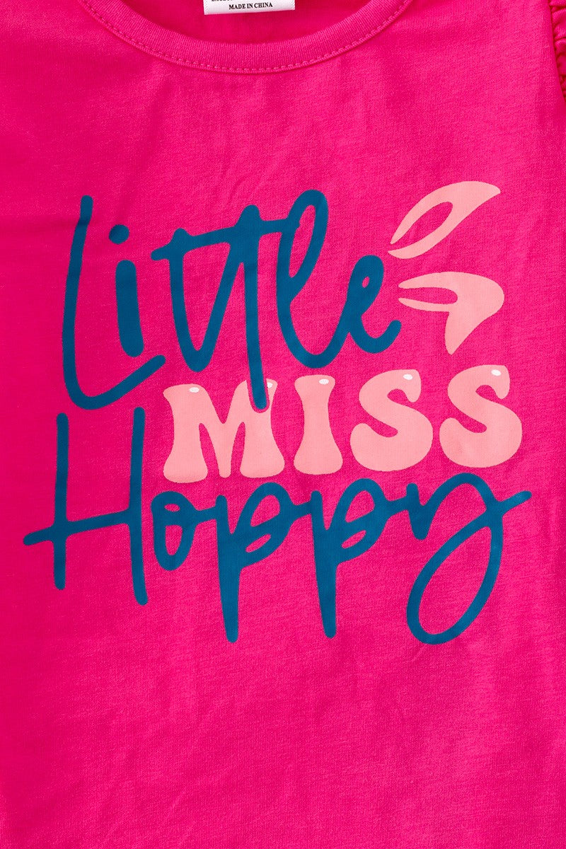 Little Miss Hoppy" fuchsia angel sleeve top & Blue floral pants.