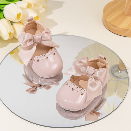 Cute heart pink front satin bow baby shoes. CG5369