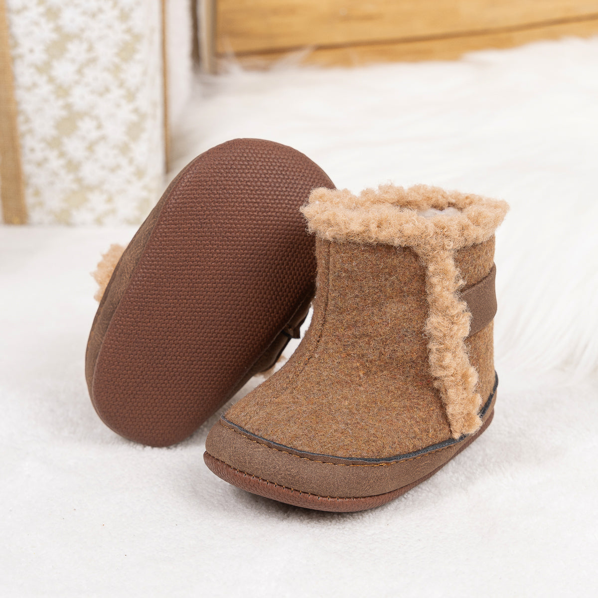 Brown faux fur baby boots. CG5402