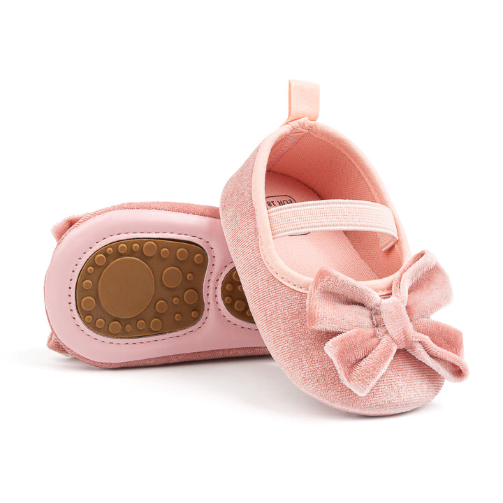 Front Bow velvety baby shoes, available in black and pink.