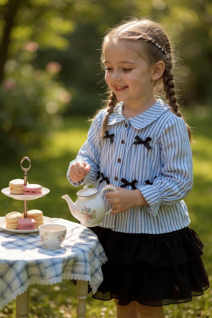 Coquette bow long sleeve top and skort.