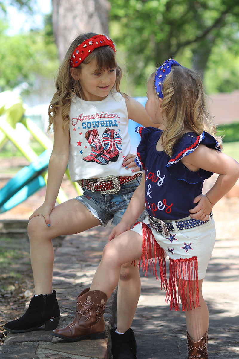 "American Cowgirl" white tank top & distressed denim shorts. OFG50583