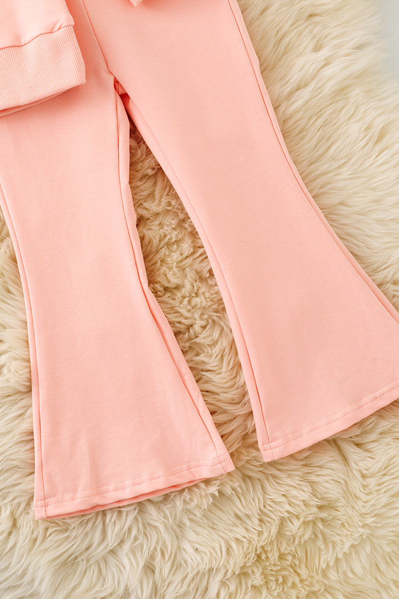 Lt Pink top & bottom set with front bow on sweater. OFG61494