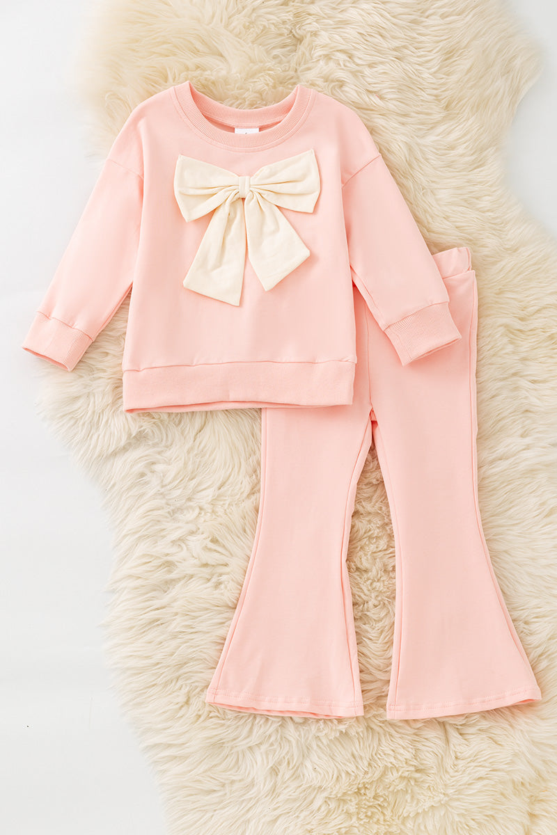 Lt Pink top & bottom set with front bow on sweater. OFG61494