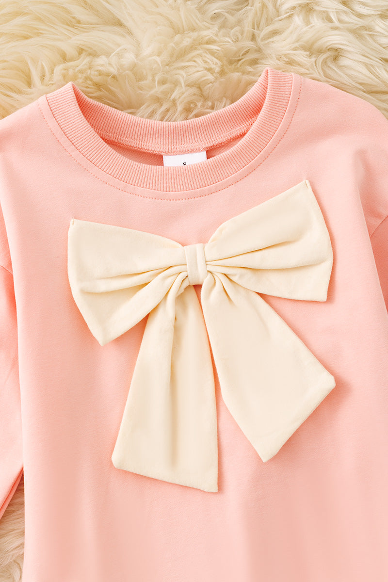 Lt Pink top & bottom set with front bow on sweater. OFG61494