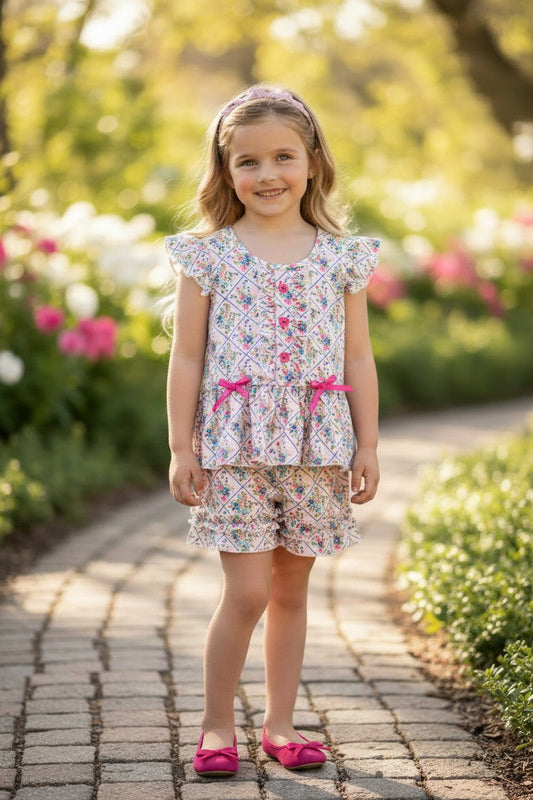 Floral printed w/fuchsia front button and ruffle shorts. OFG62612 -A-