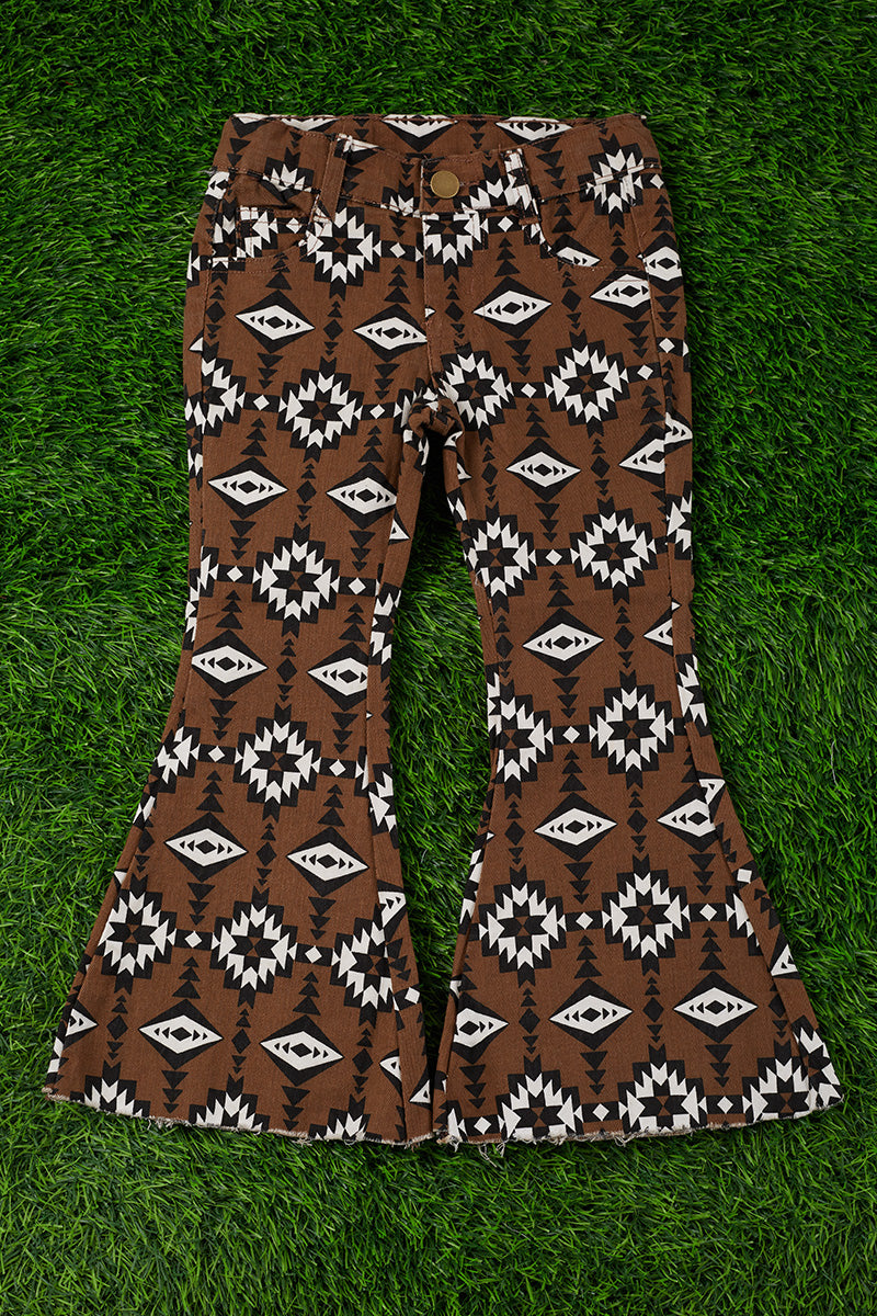Brown aztec printed bootcut denim pants.