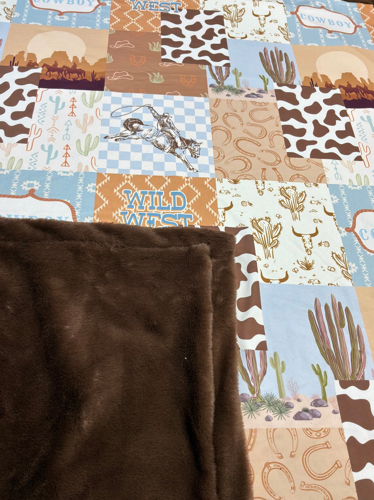 50" X 60" Faux fur western printed throw blanket.