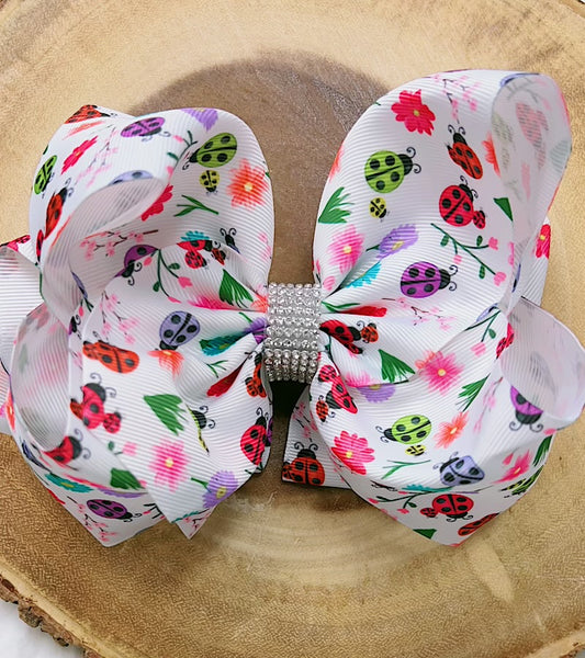 Multi Color lady bug printed double layer hair bow.