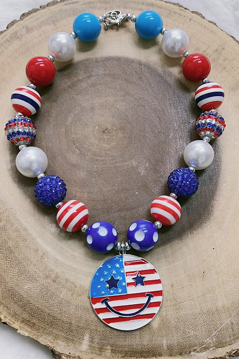 Patriotic multi-color bubble necklace with emoji pendant.  ACG-30133007