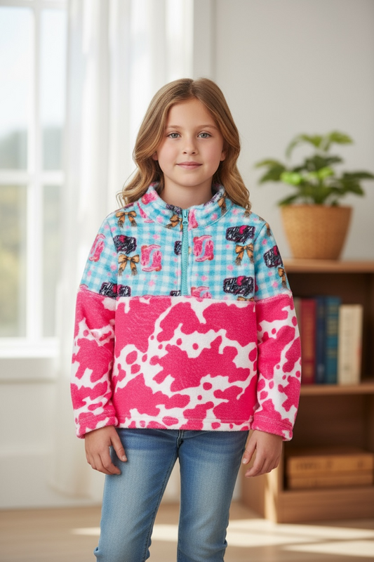 Cozy fleece pullover sweater with gingham & cow print.
