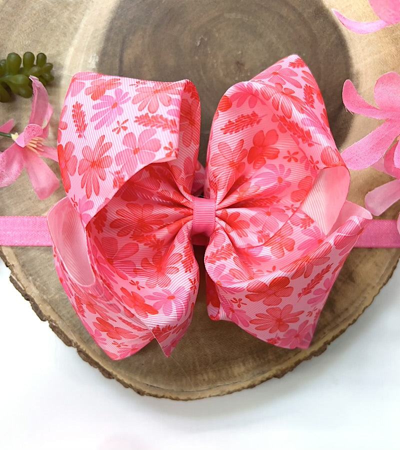 Pink floral printed headband.