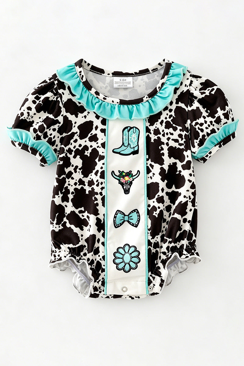 Cow printed baby romper with aqua ruffle hem. RPG64274 -M-