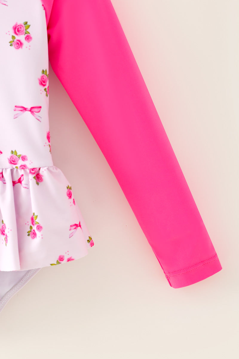 Ditsy floral swimsuit with fuchsia long sleeves. -A-