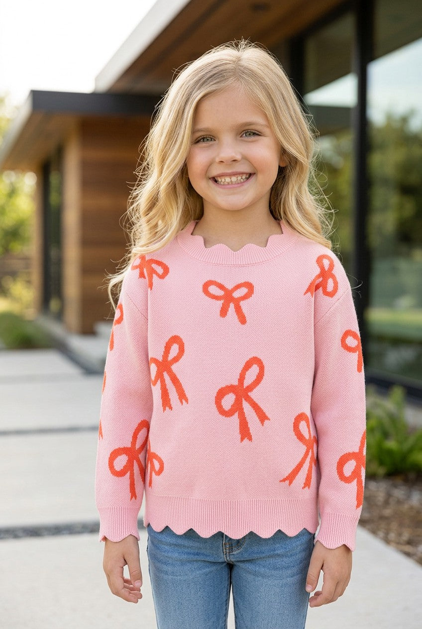 Coral bow on pink pullover knit sweater w/ scalloped hem. TPG60463 -A-