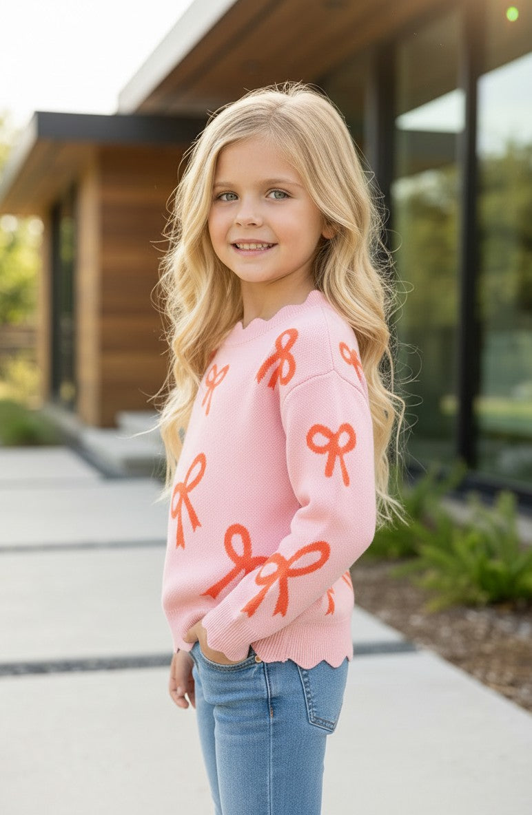 Coral bow on pink pullover knit sweater w/ scalloped hem. TPG60463 -A-
