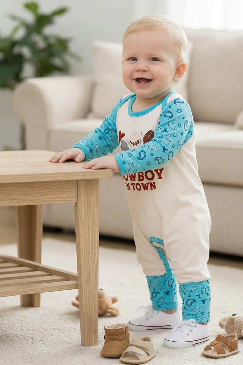 "New Cowboy In Town" Western printed baby romper w/turquoise sleeves. RPB60579